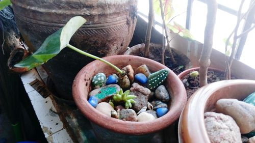 High angle view of multi colored eggs in bowl