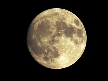 Close-up of moon against clear sky at night