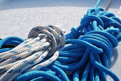 High angle view of tied ropes on boat