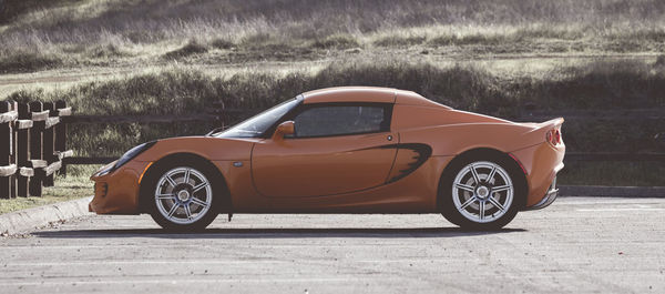 Car parked on dirt road