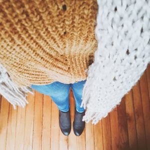 High angle view of shoes on hardwood floor