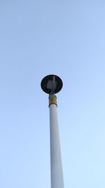 Low angle view of tower against clear blue sky