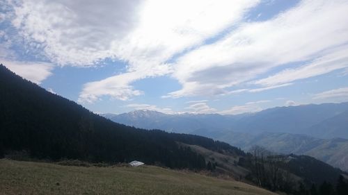 Scenic view of mountains against sky