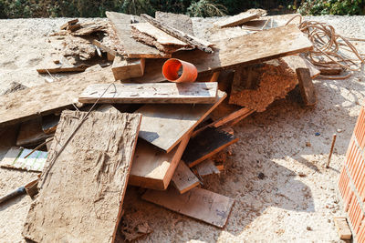 High angle view of old wooden log on field