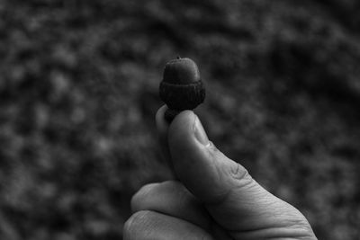 Close-up of hand holding ice cream