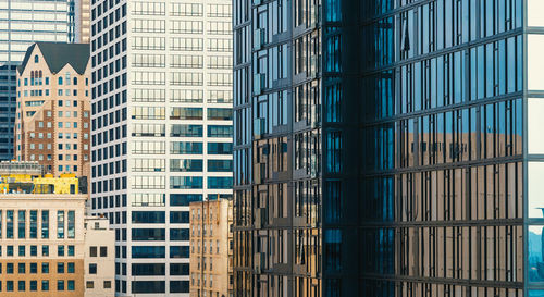Low angle view of modern buildings in city