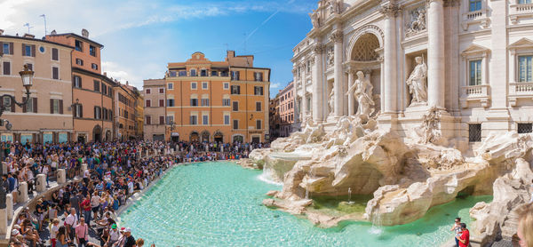 Crowd against historic building