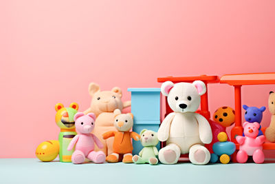 Close-up of stuffed toy against yellow background