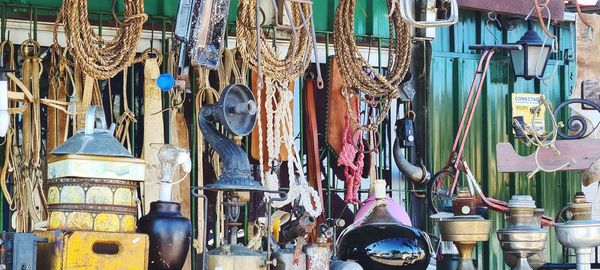 Various hanging for sale at market stall