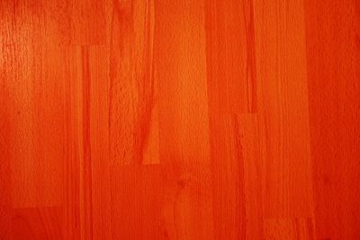 Full frame shot of orange wooden wall