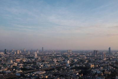 High angle view of cityscape against sky during sunset