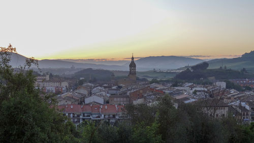 High angle view of townscape against sky during sunset