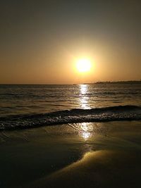 Scenic view of sea against sky at sunset