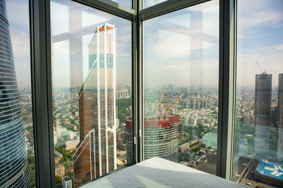 Buildings seen through window