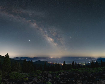 Scenic view of star field against sky at night