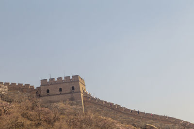 Low angle view of fort against clear sky