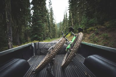 Close-up of bicycles in land vehicle