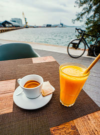 Tea cup and coffee on table