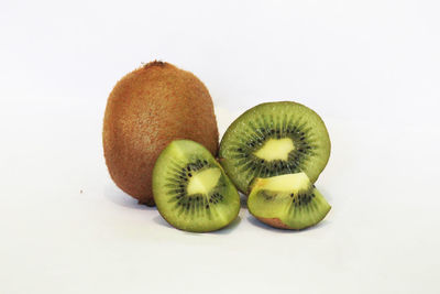 Close-up of fruits against white background