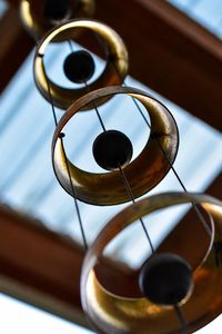 Close-up of wind chime hanging from ceiling