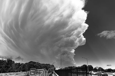 Panoramic shot of buildings against cloudy sky