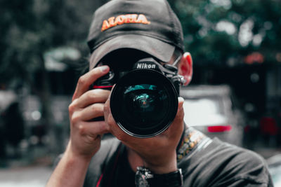 Portrait of man photographing