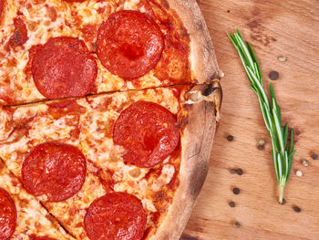 Directly above shot of pizza on cutting board