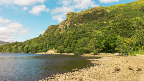 View of lake with trees in the background