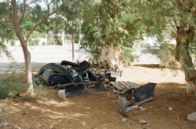 Abandoned vehicle on field