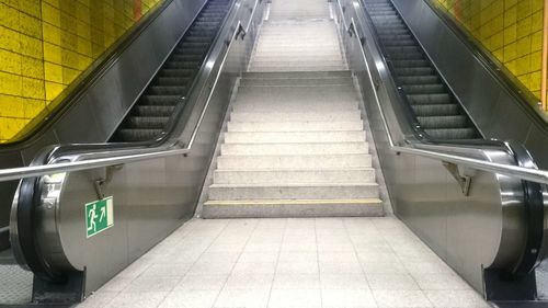 Staircase on escalator