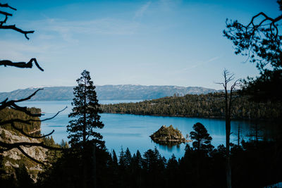 Scenic view of lake against blue sky