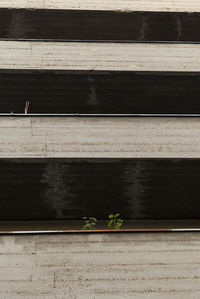 High angle view of railroad tracks by street