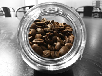 Close-up of coffee beans on table