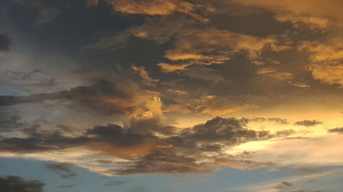 Low angle view of clouds in sky during sunset