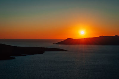 Sunset over the caldera on the island of santorini, greece