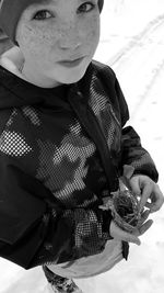 Portrait of girl holding umbrella