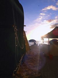 Scenic view of beach against sky during sunset