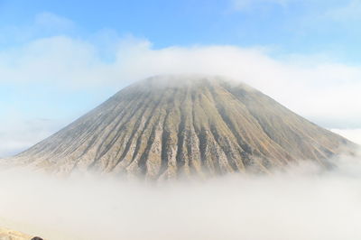 Panoramic view of volcanic mountain against sky