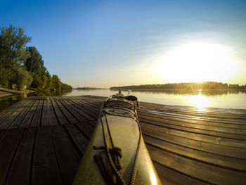 Close-up of boat against clear sky during sunset