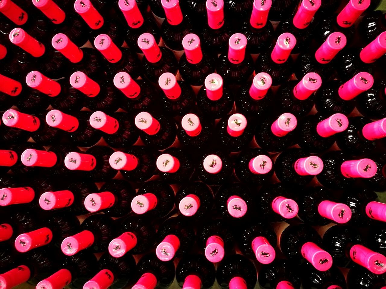 full frame, red, wine bottle, large group of objects, wine, backgrounds, no people, close-up, indoors, alcohol, wine rack, day