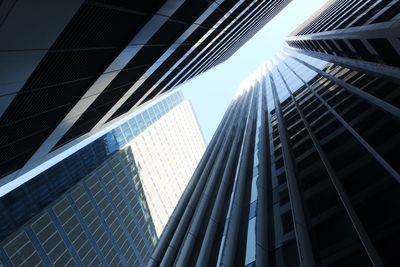 Low angle view of modern buildings against sky