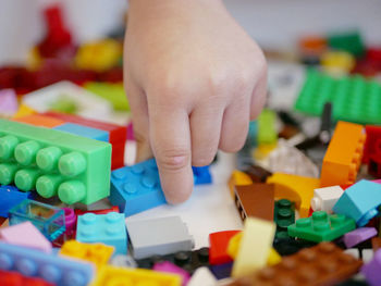 Close-up of hand holding toy