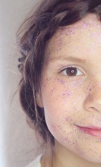 Close-up portrait of smiling girl