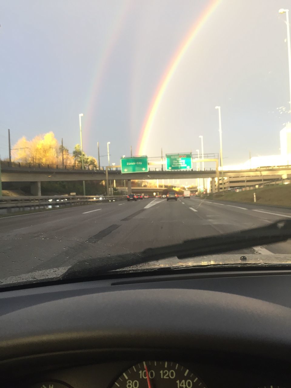 rainbow, car, outdoors, sky, no people, nature, beauty in nature, double rainbow, day