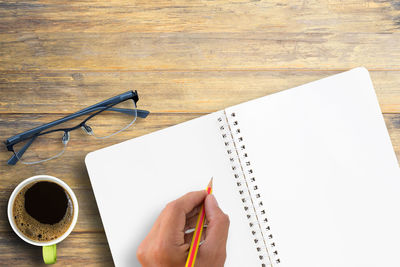 High angle view of book on table