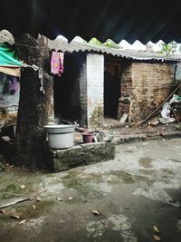 Abandoned house by building