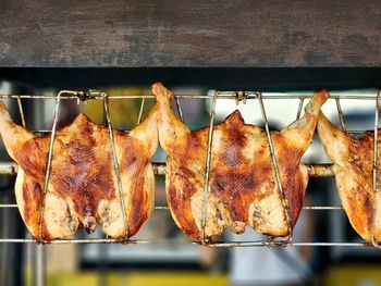 Close-up of meat on barbecue grill