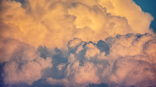 Low angle view of dramatic sky during sunset