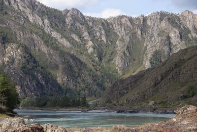Scenic view of landscape and mountains against sky