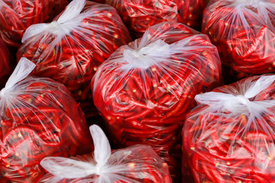 Full frame shot of red flowers in market